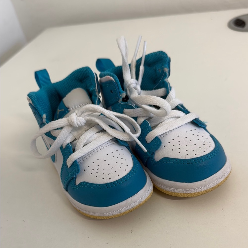 Nike Blue and White Sneakers with Low-Top Design